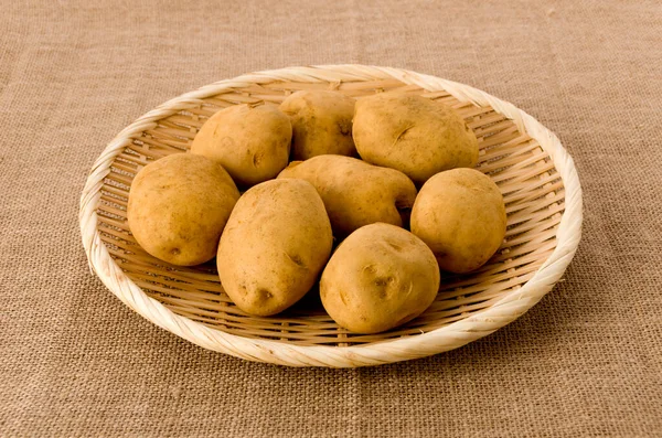 Potato Isolated Bamboo Colander Burlap Background — Stock Photo, Image