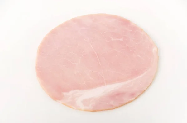 Runde Scheibe Schweinelendschinken Isoliert Auf Weißem Hintergrund — Stockfoto