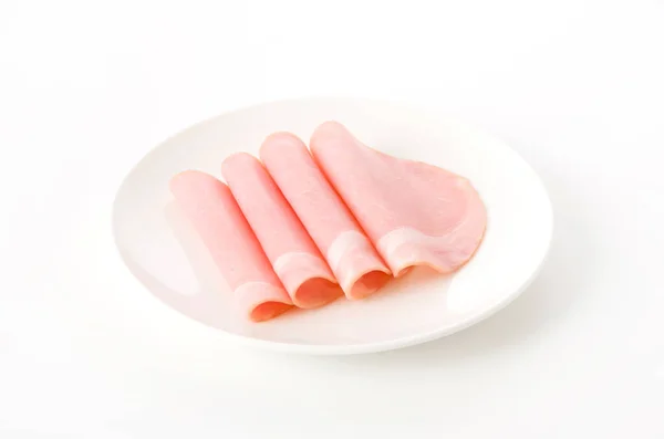 Irisan Daging Babi Loin Ham Pada Piring Latar Belakang Putih — Stok Foto