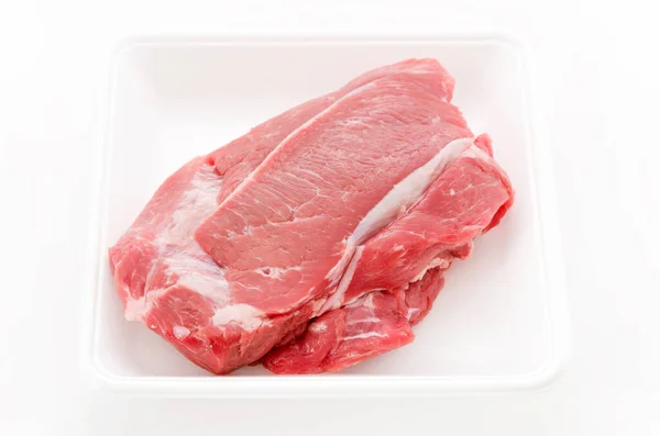 Carne Crua Porco Bandeja Espuma Fundo Branco — Fotografia de Stock