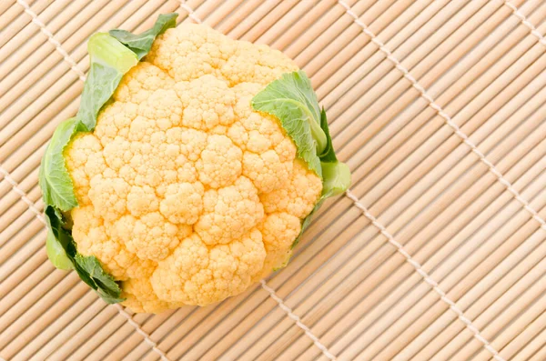 Orange Cauliflower Sushi Bamboo Mat White Background — Stock Photo, Image