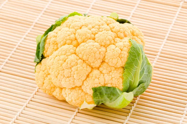 Orange Cauliflower Sushi Bamboo Mat White Background — Stock Photo, Image