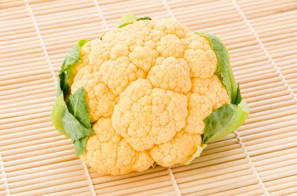 Orange Cauliflower Sushi Bamboo Mat White Background — Stock Photo, Image