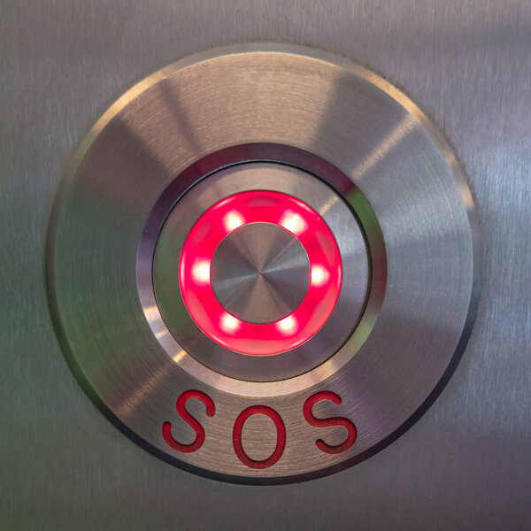 Modern SOS, help button made of stainless steel metal and illumi