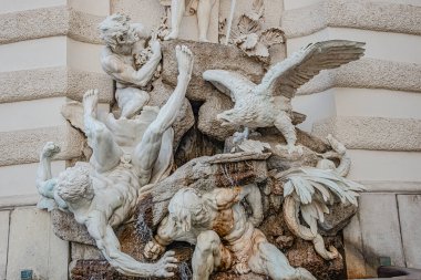 Hofburg İmparatorluk Sarayı 'ndaki Power of Land çeşmesi Saint Michael Meydanı, açık hava, Viyana, Avusturya, ayrıntılar, yakın çekim.