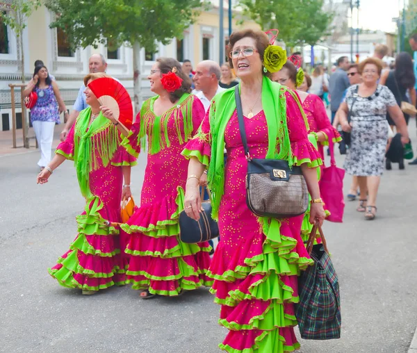 Ladies in matching Flamenco dresses — Stock Photo, Image