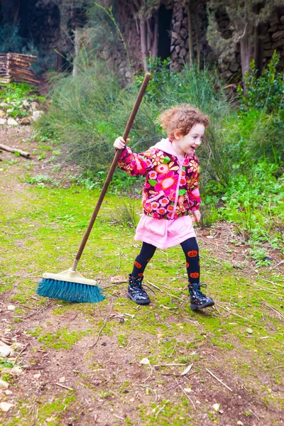 Joyful Little Girl Sweeping Broom House Backyard — Stock Photo, Image