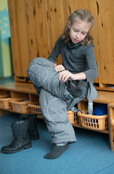 Little girl dressing up in kindergarten. — Stock Photo, Image