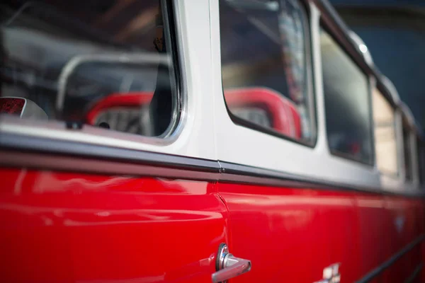 Part of red retro bus with passenger seats. — Stock Photo, Image