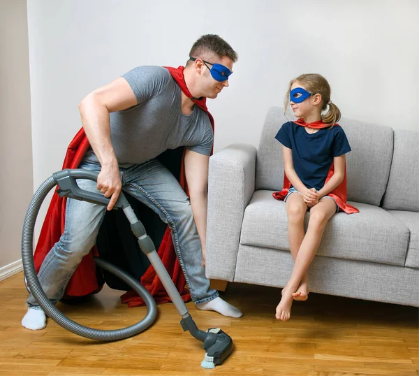 Ordinary day of superhero family. Dad doing housework. — Stock Photo, Image