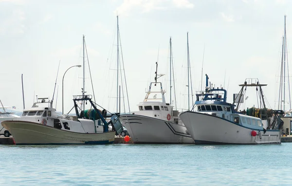 Three fishing vessels in the port. — Stock Photo, Image