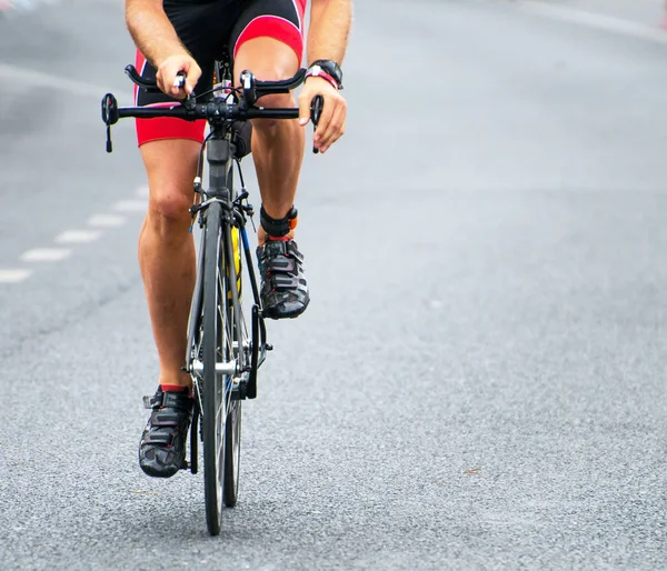 Unrecognizable professional cyclist during the bicycle competition.