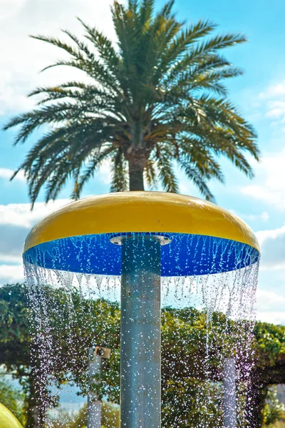 Decorative mushroom with shower in the water park. — Stock Photo, Image