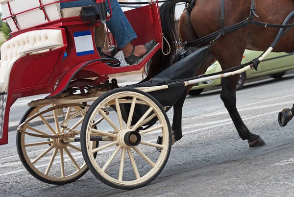 Horse-drawn carriage running in the old town. — Stock Photo, Image