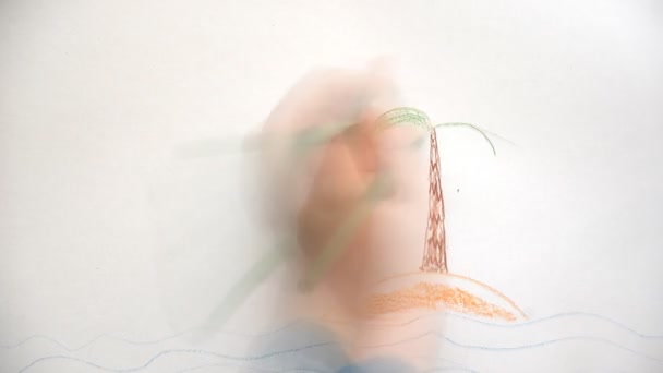 Child hand drawing island with palm. — Stock Video