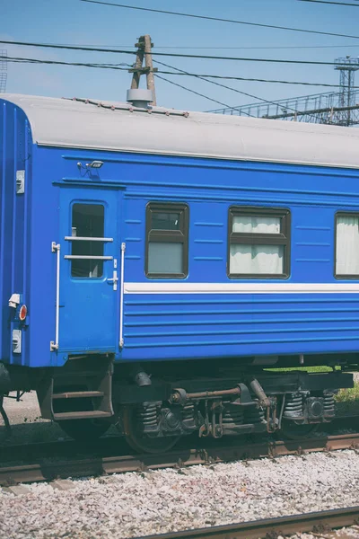 Blue passenger train wagon on the ways. — Stock Photo, Image