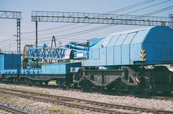 Blue railroad crane on the ways. — Stock Photo, Image