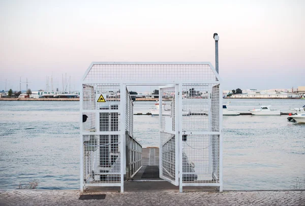 Secured entrance to the pier with boats. — Stock Photo, Image