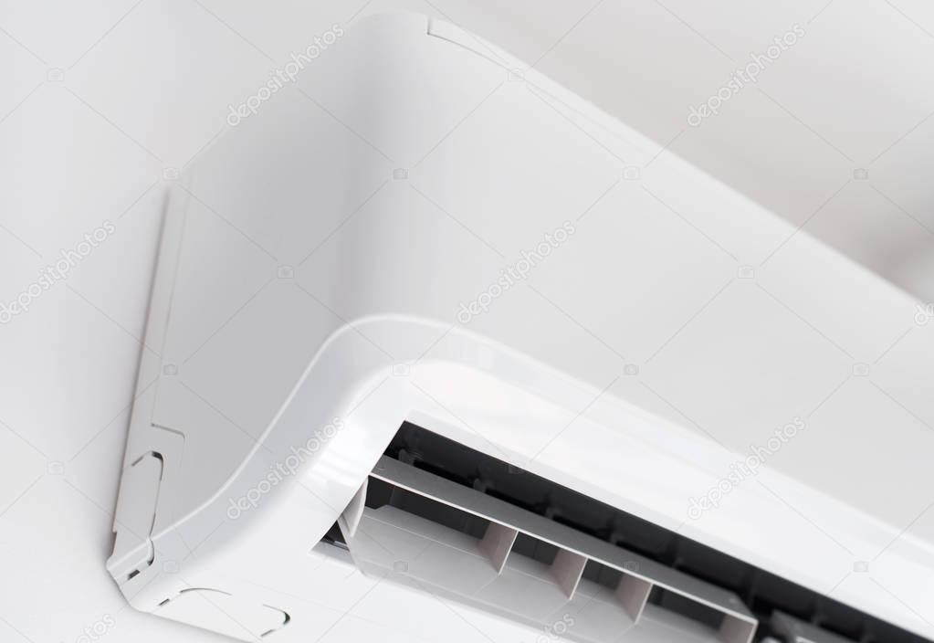 Air conditioner inverter mounted on the wall.