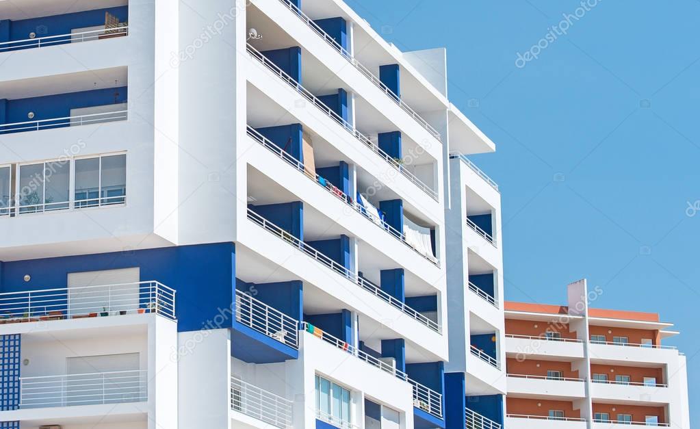Blue apartment building in Portimao city, Portugal.