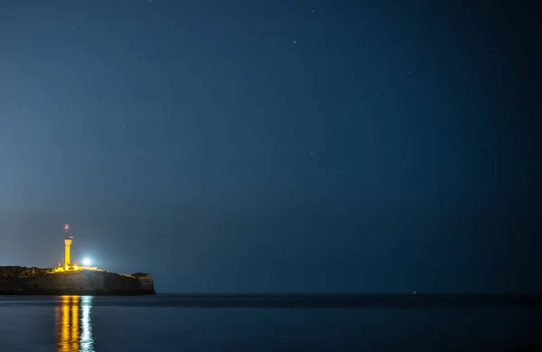 Lighthouse at night in Portimao, Portugal. — Stock Photo, Image