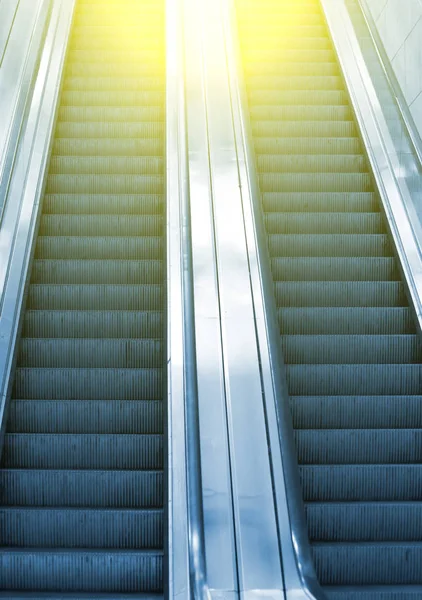 Electric escalator in metro. Moving staircase.