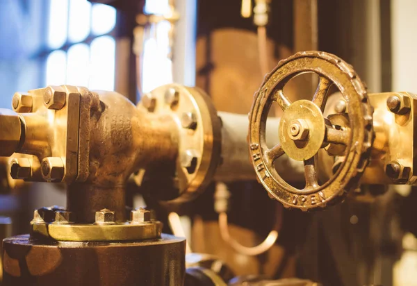 Gold Valve. Part of old power plant. — Stock Photo, Image