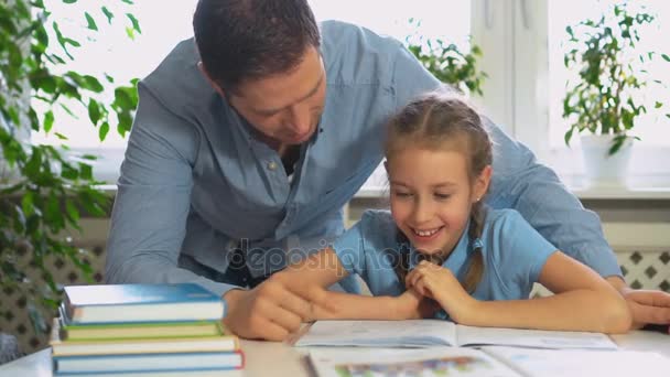 Father Helping Daughter Homework Home — Stock Video