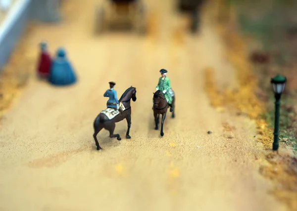 The world in miniature. Soldiers on horseback. — Stock Photo, Image