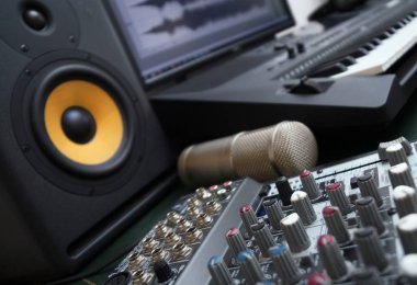 Mixer, condenser microphone and professional monitor. Concept of home music studio. clipart