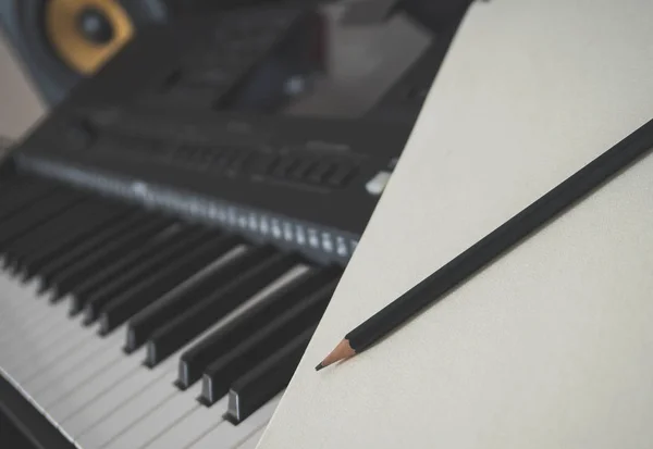 stock image Piano keyboard, pen and sheet. Concept of composing song.