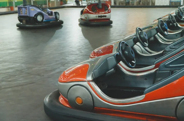 Bumper cars in the city amusement park at evening. — Stock Photo, Image