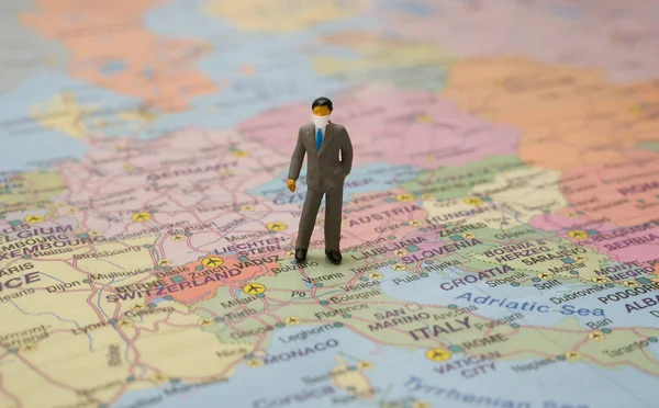 Figurine Asian Businessman Wearing Medical Mask Map Middle Europe — Stock Photo, Image