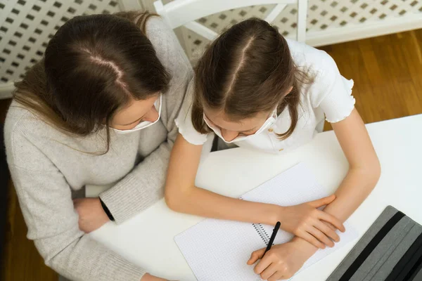Schoolgirl Her Mother Distance Learning Doing Homework Home Schooling Concept — Stock Photo, Image