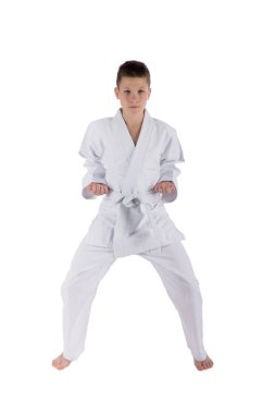 karate teknikleri izole beyaz arka plan üzerinde Studio ile poz çocuk