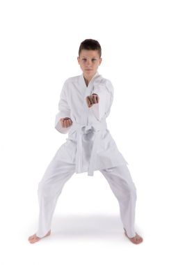 karate teknikleri izole beyaz arka plan üzerinde Studio ile poz çocuk