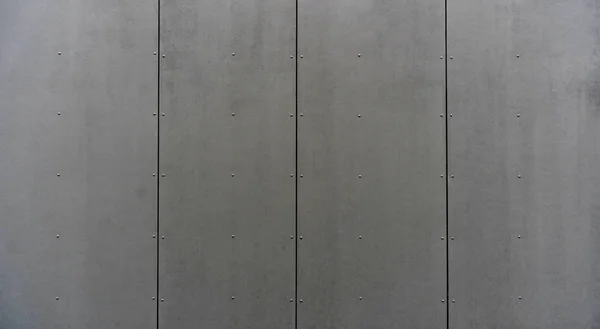 Materiales modernos en la industria de la construcción. Textura de revestimiento metálico de un primer plano de fachada de edificio. — Foto de Stock