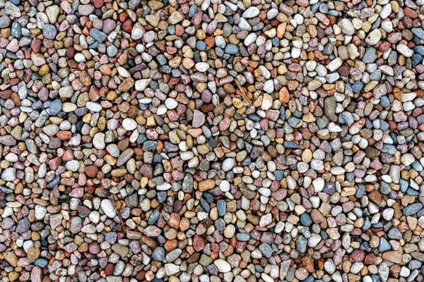 Assorted colorful and smooth pebbles from the beach — Stock Photo, Image