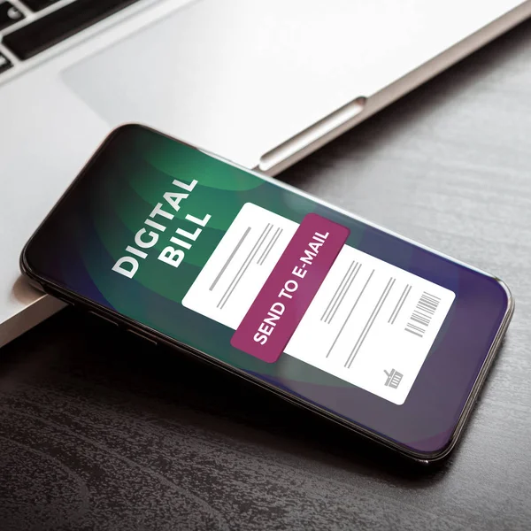 Digital bill on mobile internet banking concept. Electronic digital receipt or invoice on smartphone screen with a laptop in the background. Online money transaction with phone.