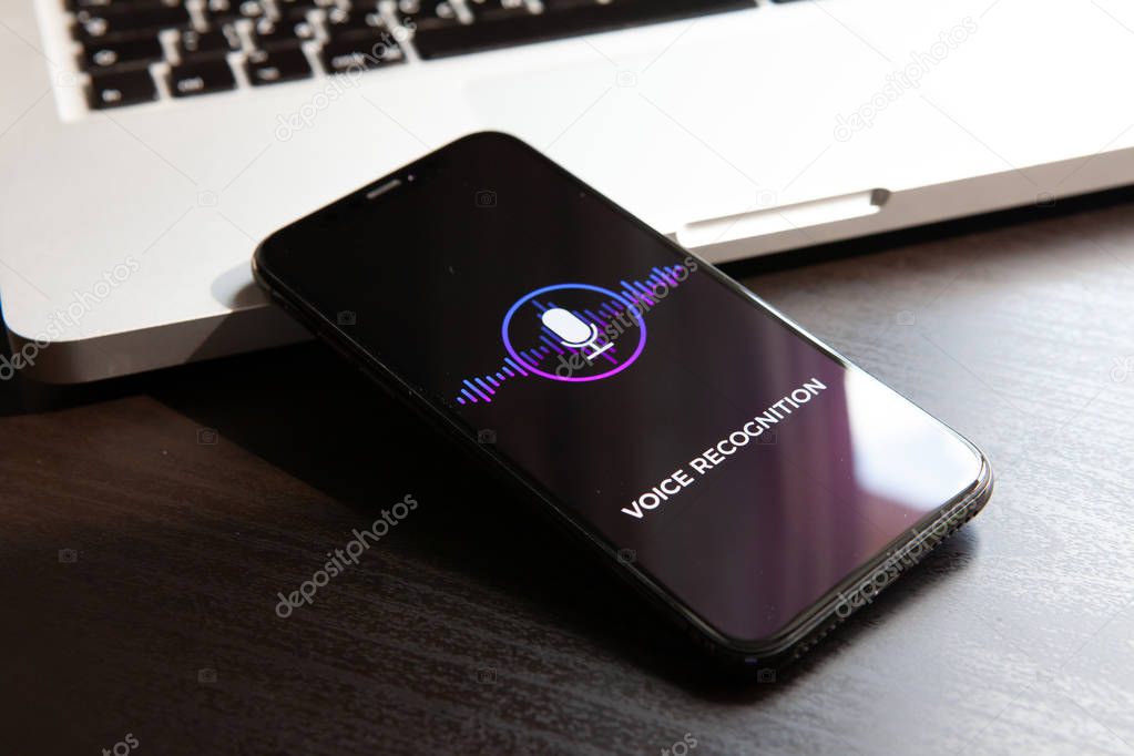 Voice recognition siri search technology, speech detect and deep learning AI device concept. Artificial Intelligence Application on mobile phone screen with recording microphone and sound waves icon.