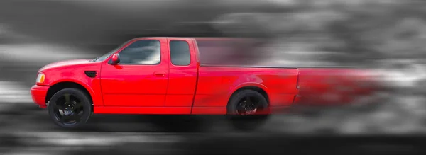 Red American truck in motion — Stock Photo, Image