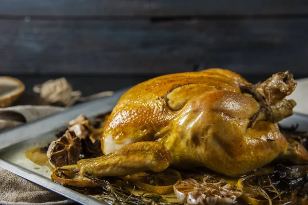 Baked chicken with lemon, garlic and herbs.