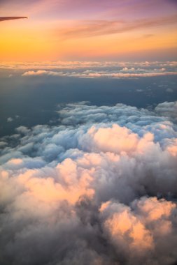Beautiful sunset above clouds clipart