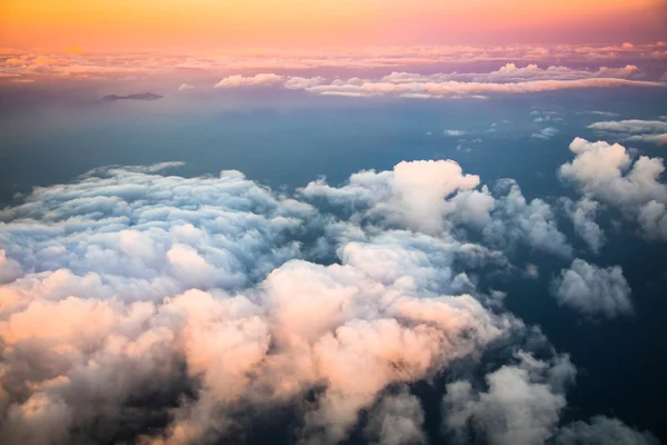 Beautiful sunset above clouds — Stock Photo, Image