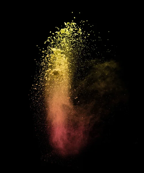 Explosion of colored powder on black background — Stock Photo, Image