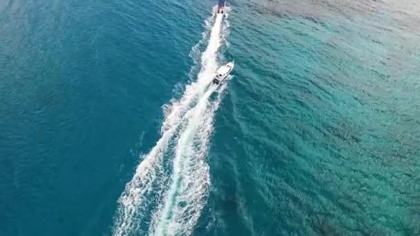 Aerial view of two speed boats — ストック動画