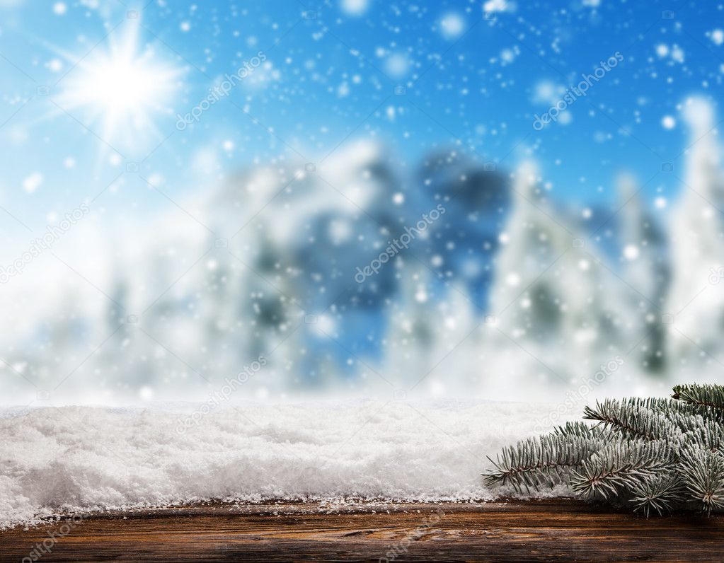 Empty wooden planks with snowy background