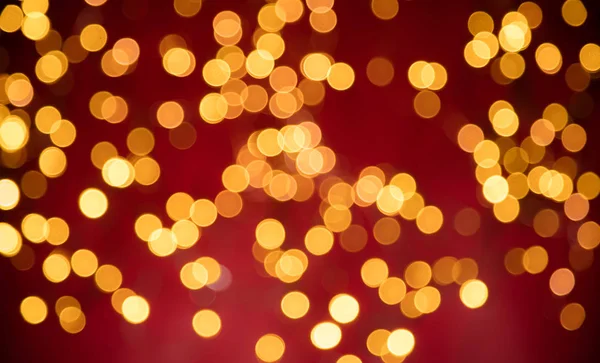 Blurred abstrato luzes ponto dourado — Fotografia de Stock