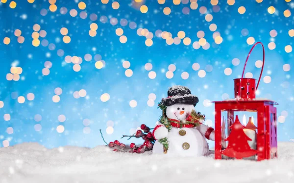 Christmas background with snowman and lantern — Stock Photo, Image