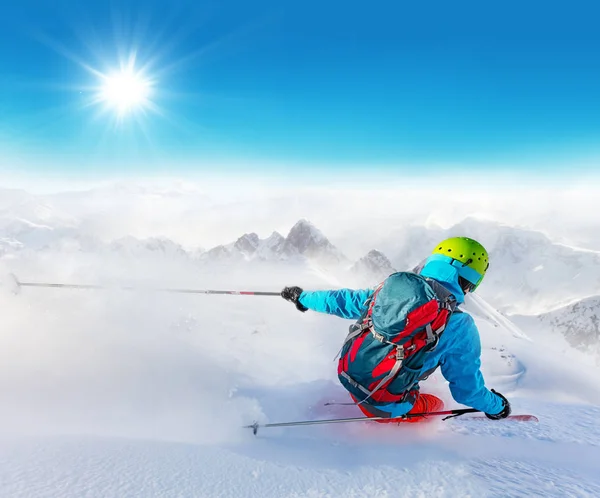 Freeride skier on piste running downhill — Stock Photo, Image